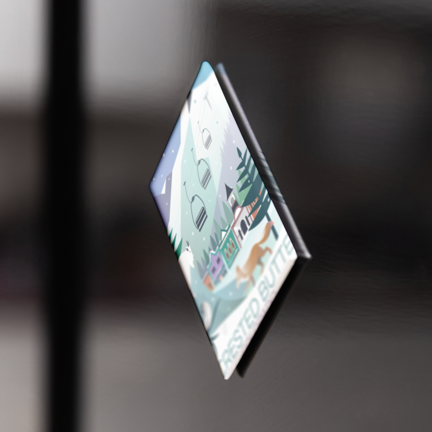 Crested_Bute_Winter_RectangleButtonMagnet_V_BlackFridge_Mockup.png